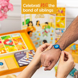 Rakhi Celebration Hamper for brother (7 inclusions)- Thai Chilli Blend 40g, Smoked Cocktail Mixed Nuts 40g, Daily Nuts 35g, Barbeque Almonds 40g, SoxyToes Socks, with Plantable Seed Rakhi & Roli Chawal Chandan Mishri Set